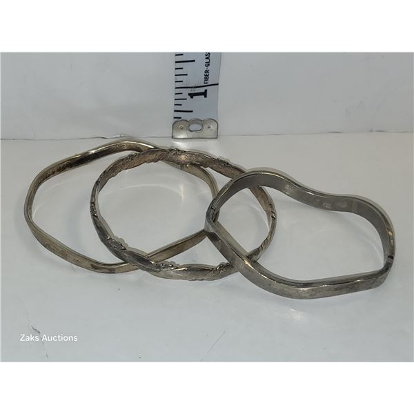 Approximately 2 OZ of Silver Bracelets