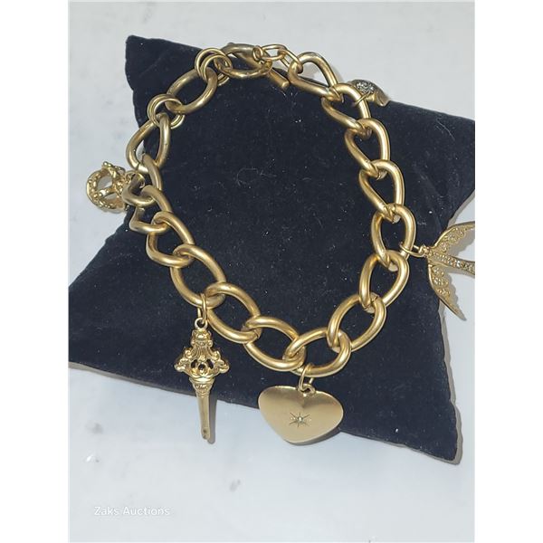 Vintage Stalla and Dot Wonderland Goldtone Charm Bracelet
