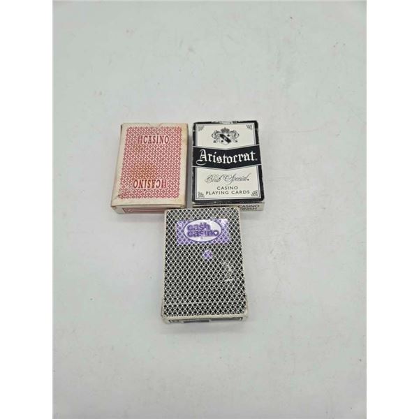 three packs of playing cards