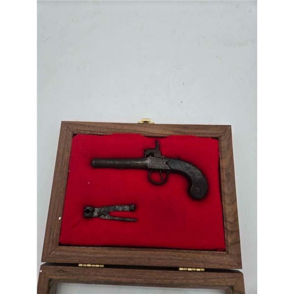 Cased Antique Percussion pistol with acutrements