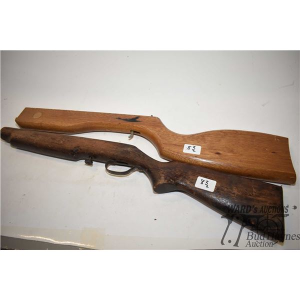 Two wooden rifle stocks