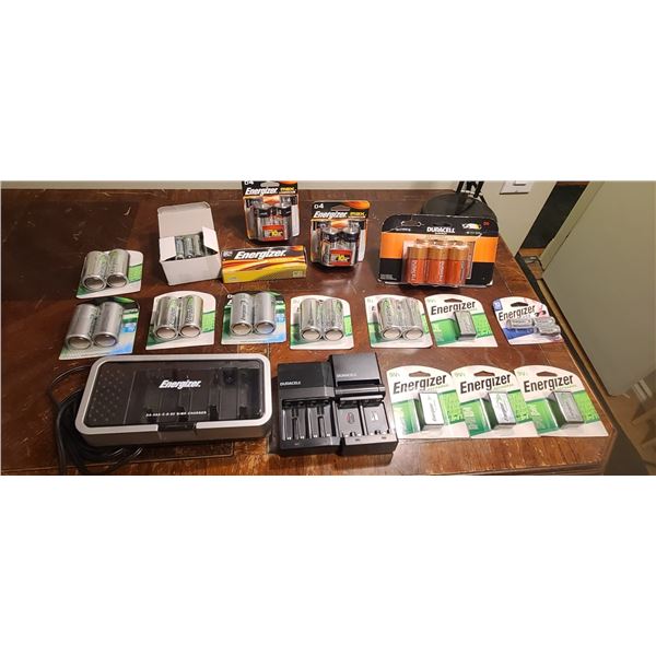 BOX WITH BATTERY CHARGER AND LOTS OF BATTERIES DOUBLE A, D AND 9V