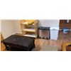 Image 1 : STAND, BLACK COFFEE TABLE, GAME. BISSELL UPRIGHT VAC.AND 2 GARBAGE CANS