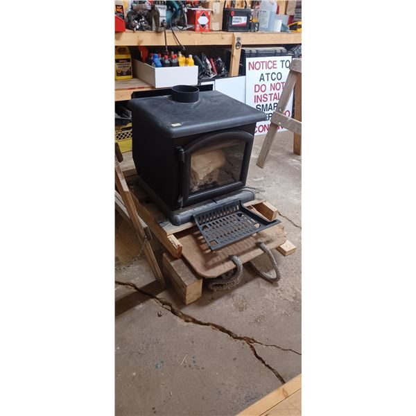 NEW WOOD STOVE  COMES WITH HARDWARE