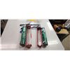 TWO LARGE CAUKLING GUNS AND TWO TUBES OF ACUSTIC SEALER