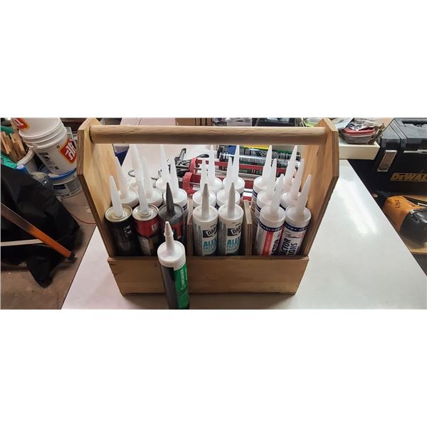 WOOD CRATE WITH MULIPLE TUBES OF CAULKING