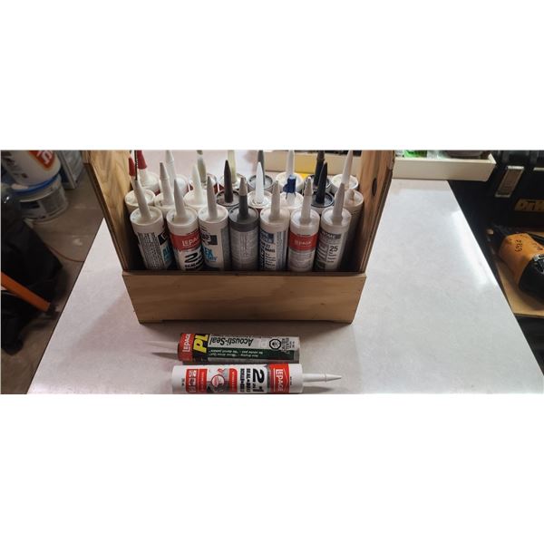 WOOD CRATE WITH MULIPLE TUBES OF CAULKING