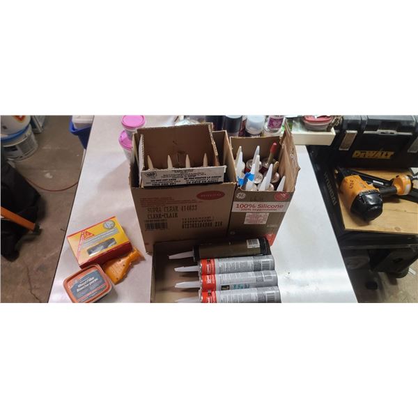 32 TUBES OF CAULKING
