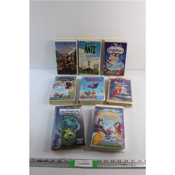 (8) VHS-Cassette Movies - Walt Disney Cinderella, Richie Rich and Monster's Inc