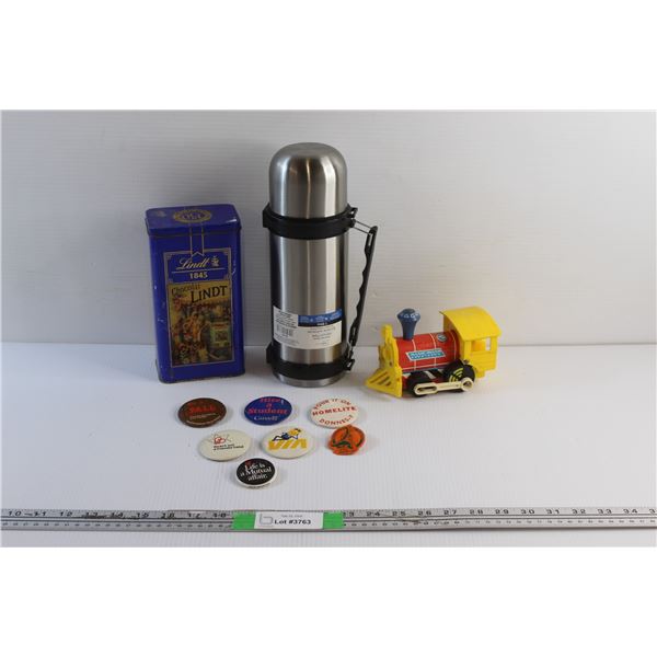 Lindt Chocolate Tin, Vacuum Flask, Fisher Price Toot Toot Train Toy and Shirt Pins