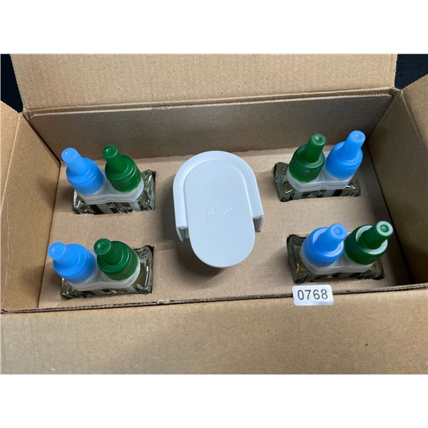 Box of 1 Febreze Plug-In Wall-Plug Air Freshener with 4 Gain Scent Febreze Oil Refills - Brand New!