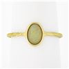Image 1 : Vintage Handmade 18k Gold Oval Cabochon Cut Opal Solitaire Petite Cocktail Ring