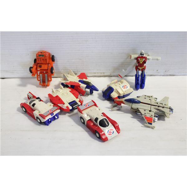 LOT OF 8 1980'S BANDAI & TOMMY TRANSFORMERS