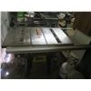 Image 1 : 10" table saw with excellent fence and miter. Wired for 220V, but easily converted to 115V