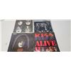 Image 1 : 3 Kiss records and a Queen record