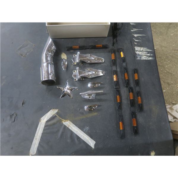 lot of chrome car parts and lights