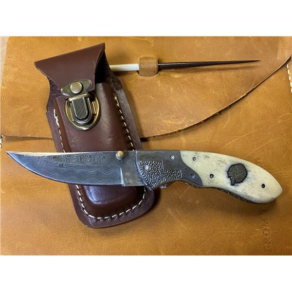 RUSSELL & MARY EDITH STACY: Buck Knives Folding Knife with Leather Sheath