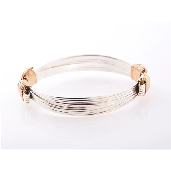 RUSSELL & MARY EDITH STACY: Pair of Safari Jewelry Two-Tone Bracelets