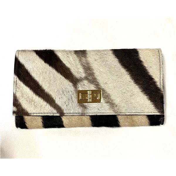 FEDHA NYUKI: Stunning Ladies Zebra Hide Clutch