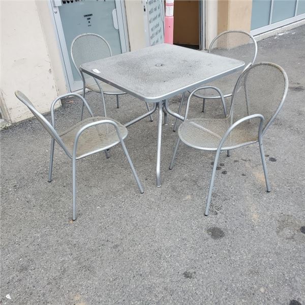 PATIO TABLE AND 4 METAL CHAIRS