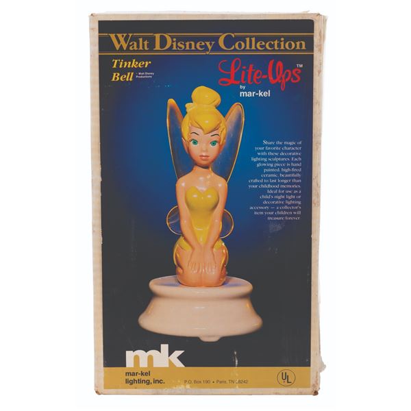 A Tinker Bell Walt Disney Collection Lite-Up Lamp.