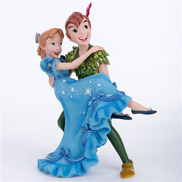 A Peter Pan and Wendy Darling Figurine.