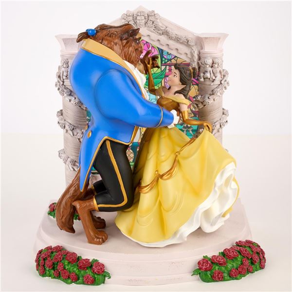A Light-Up "Beauty and the Beast" Figurine.
