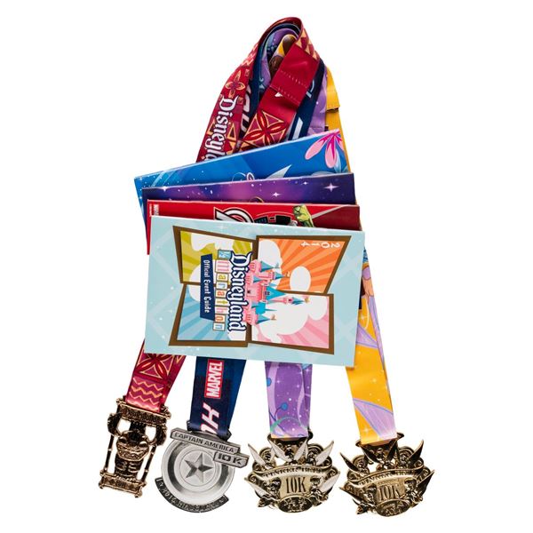 A Disneyland 10K Medal and Event Guide Collection.