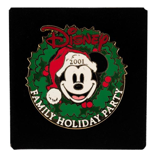 A 2001 Disney Family Holiday Party Pin.