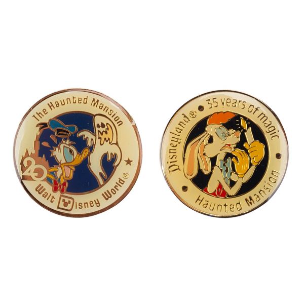 A Pair of Haunted Mansion Years of Magic Pins.