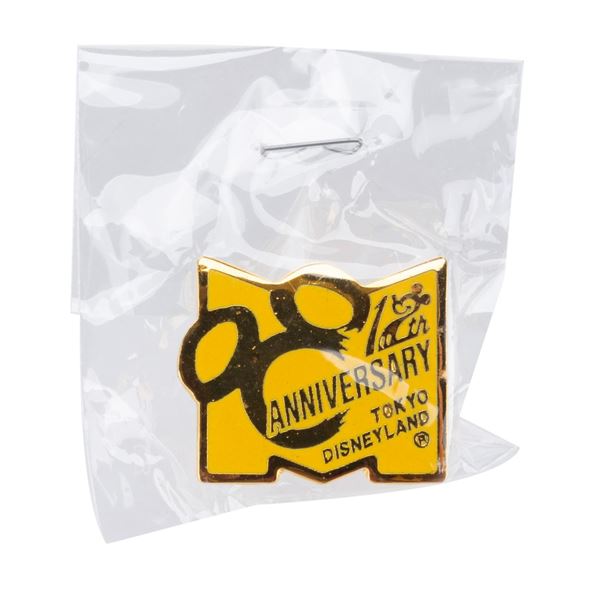 A Tokyo Disneyland 12th Anniversary Pin.