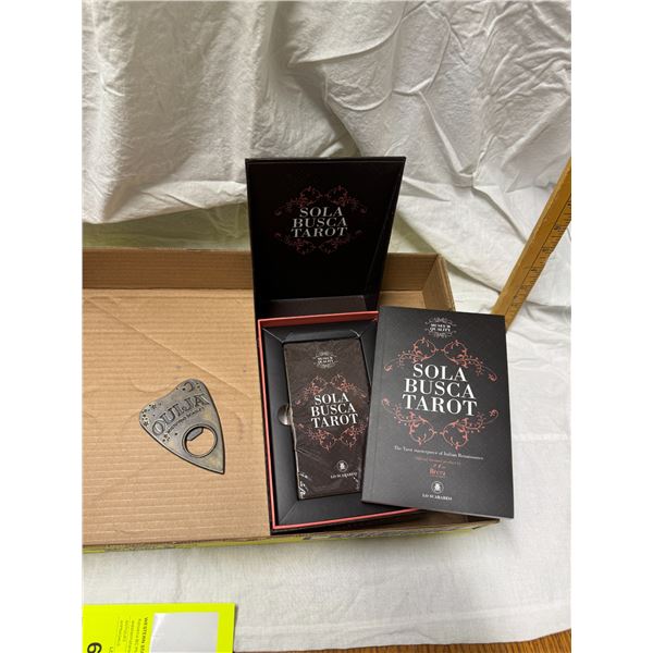 Tarot cards and book and Ouija item