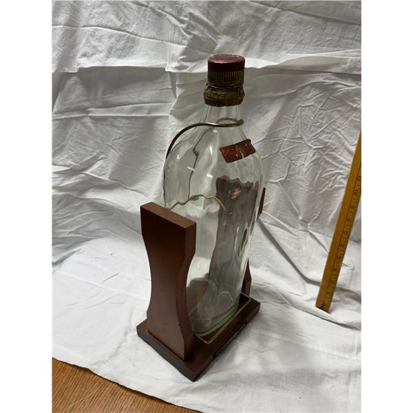 Johnny Walker bottle in stand