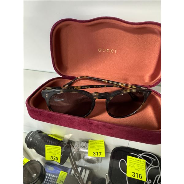 Sunglasses and Gucci case