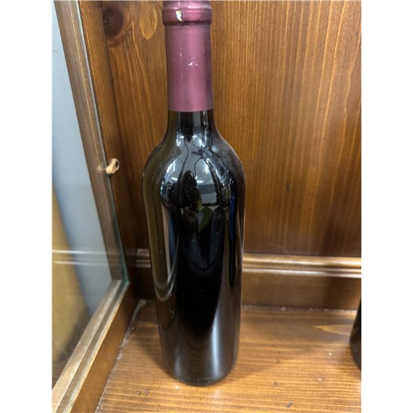 New sealed bottle and contents