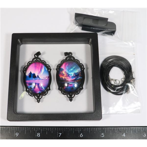 TWO ELEGANT PENDANT NECKLACES IN FLOATING