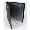 Image 1 : DISCREET BINDER WITH TWO USED PAGES WITH  HOLDERS LARGE ENOUGH FOR CAPSULATED COINS