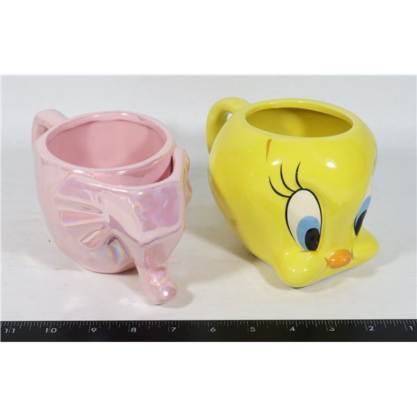 2 LARGE MUGS, ONE TWEETY BIRD AND ONE PINK