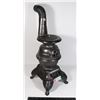 Image 1 : VINTAGE CAST IRON STOVE MODEL HAS REPAIRS