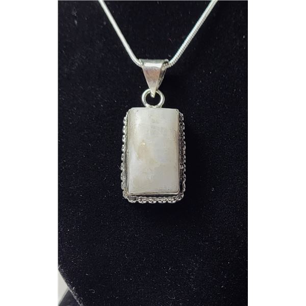 25)  RECTANGULAR CUT NATURAL MOONSTONE