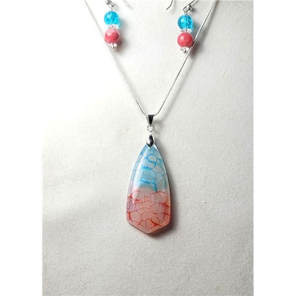 29)  SHIELD SHAPED NATURAL BLUE & CORAL COLORED