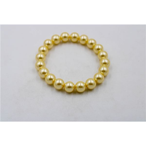 #115-SEA SHELL PEARL BRACELET 10MM/7.5"