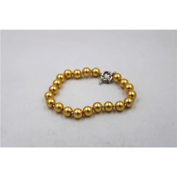 #119-SEA SHELL PEARL BRACELET 8MM/7.5"