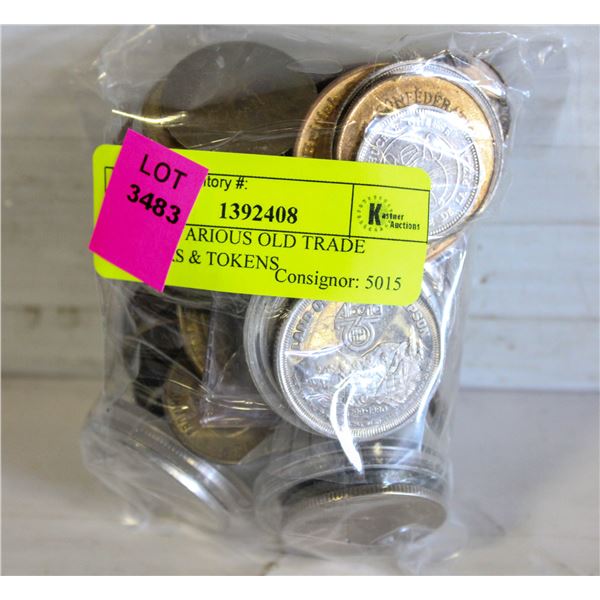BAG OF VARIOUS OLD TRADE DOLLARS & TOKENS