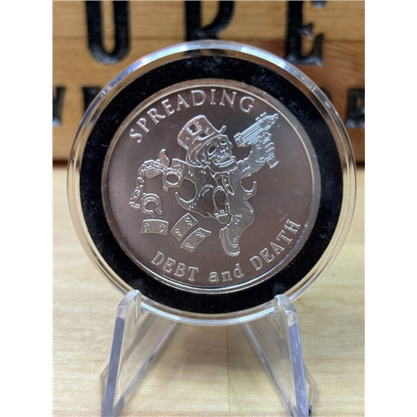 Lot 15-1) 1 oz Spreading Debt and Death silver round