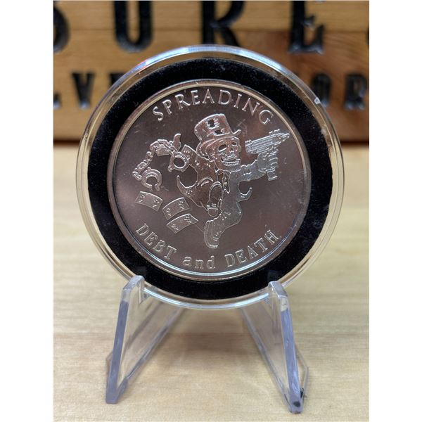 Lot 28-1)  1 oz Spreading Debt and Death silver round