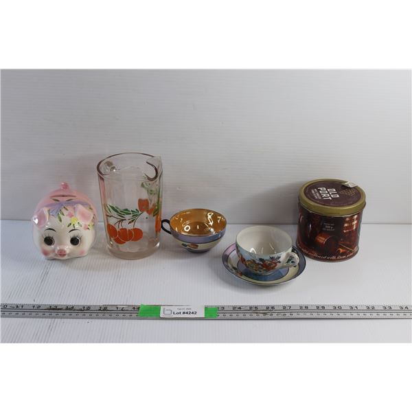 (2) Ceramic Tea Cups and (1) Coaster, Ceramic Piggy Coin Bank, Glass Pitcher and Vintage Old Port To