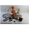 Image 1 : Grain Elevator Coin Bank, Scandinavian Compass, Hockey Pucks, 3lb Dumbbell, Face Roller, Ceramic Flo