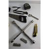 Image 6 : Safety Straps, Soldering Gun, Power Bar, Hand Saw, Tape Measure, Box Cutter, Adjustable Wrench and M