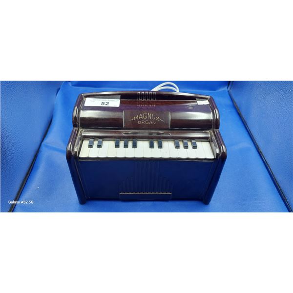 Vintage Magnus toy organ, tested 11" x 7"